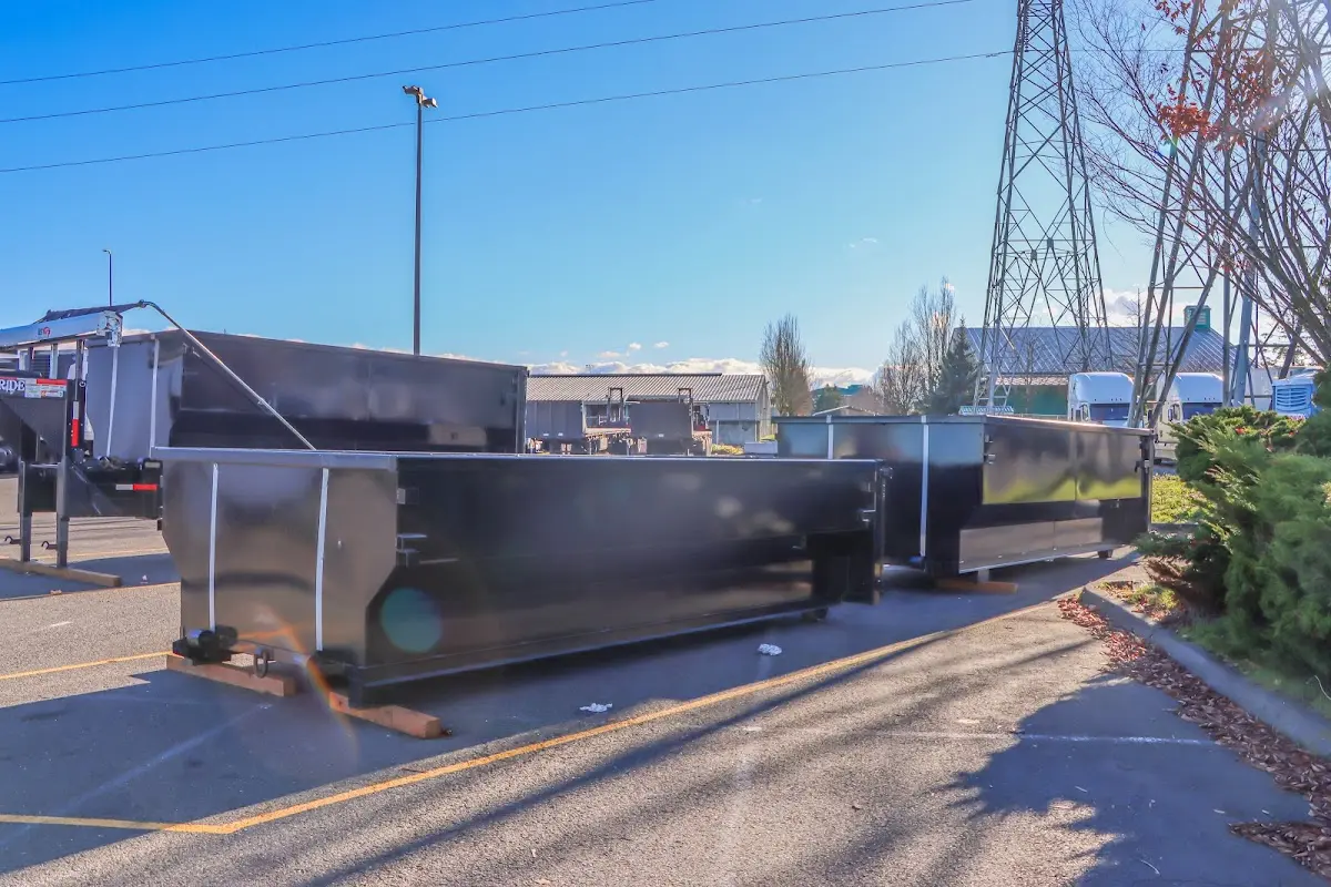 Roll-off dumpster ready for waste disposal at job site for Commercial Dumpster Rental in St. Stephens